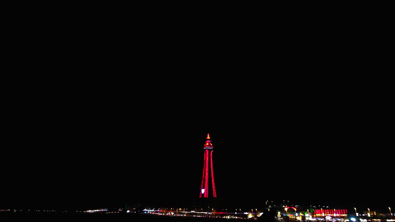 Blackpool tower illuminates multiple colours in the dark night sky for the annual Switch on event in 2020.