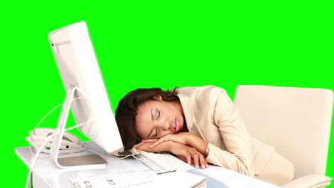 Businesswoman-sleeping-on-her-desk