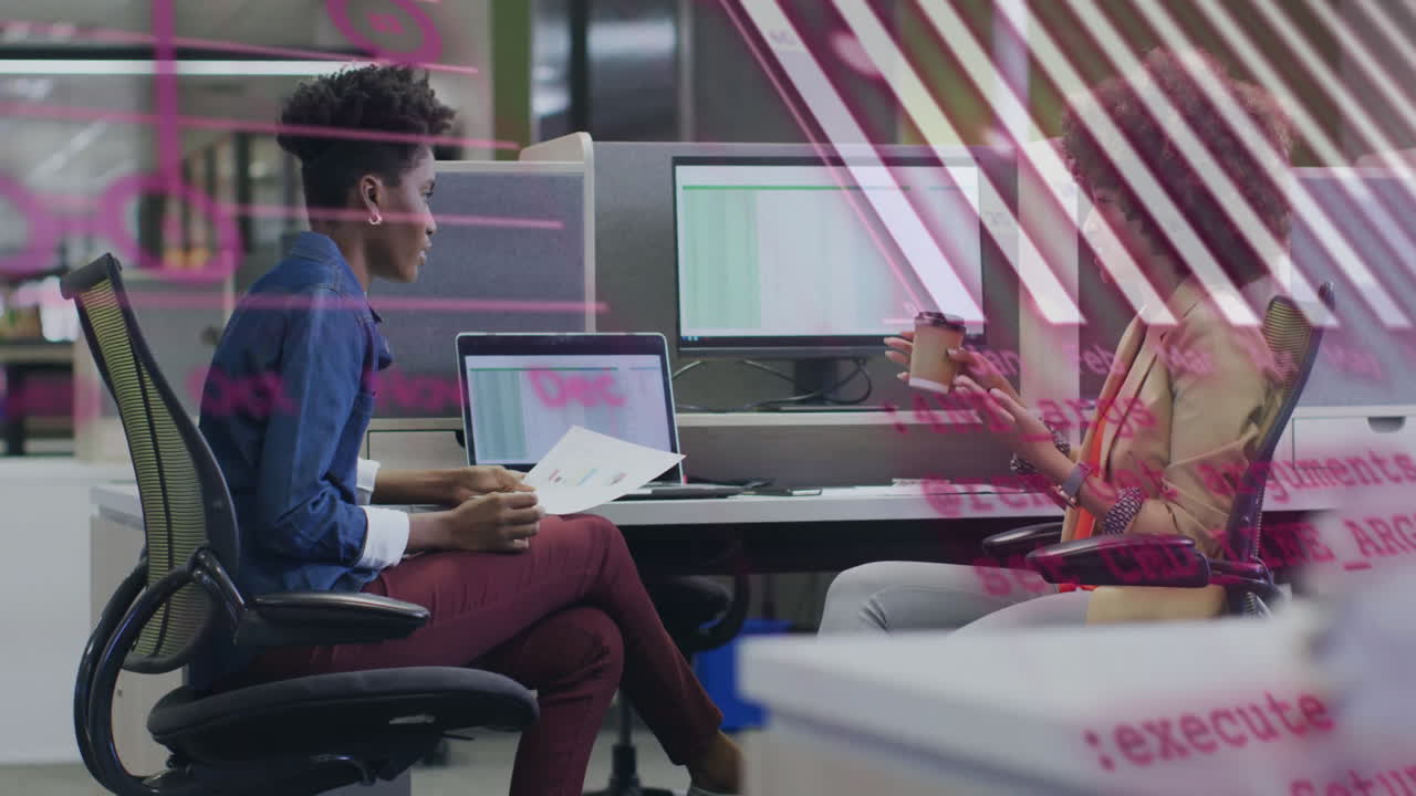 Animation of data processing and diagrams over diverse female colleagues discussing work in office