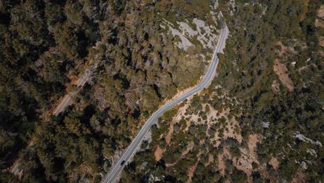 modern car driving at sa calobra, palma de mallorca