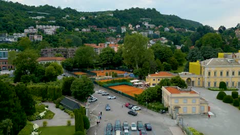 4k aerial drone video of the tennis courts at the beautiful lakeside villa olmo on lake como, italy
