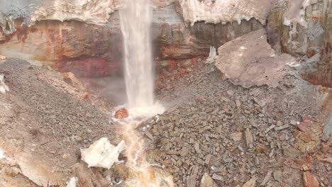 waterfall cascading down a rocky ravine