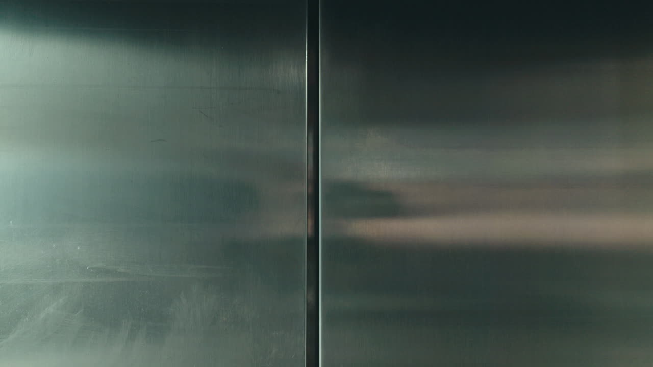 Business woman, elevator and walk with suitcase