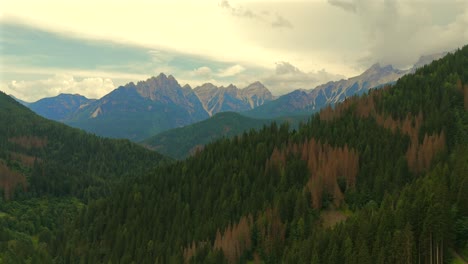 the drone’s sweeping shots reveal winding roads snaking through the picturesque landscape of fusine.