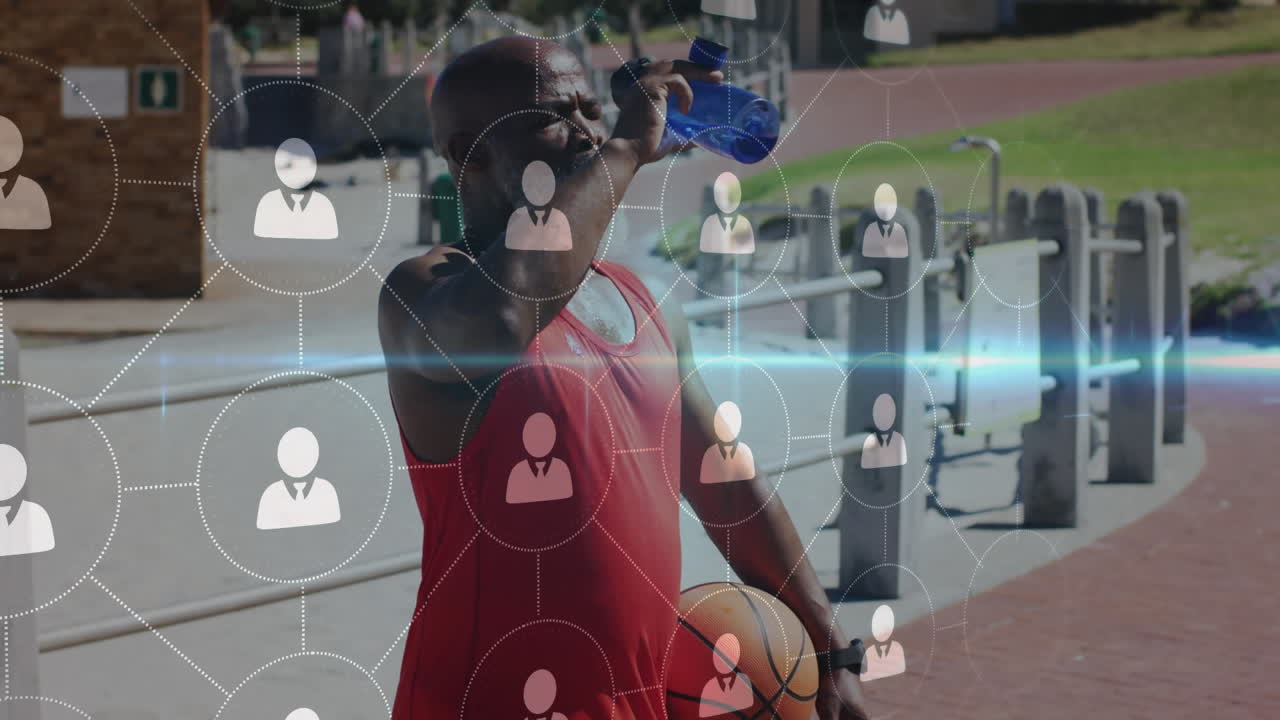 Animation of network of connections over senior african american man drinking water at beach