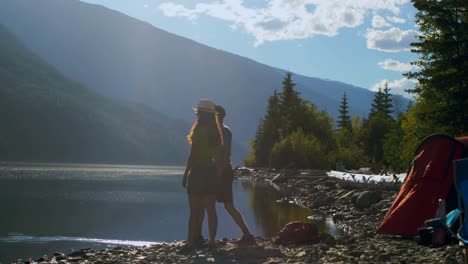 couple having fun near riverside 4k