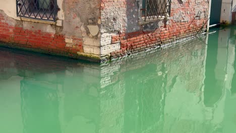 water canal in venice, italy in sunny day. slow motion 24p video recorded at 60p