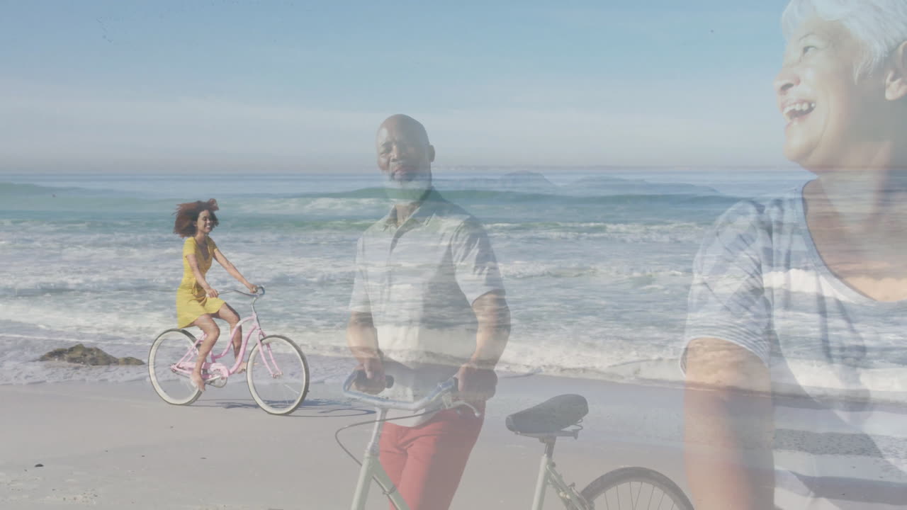 Riding bicycles on beach, couple smiling with ocean waves in background