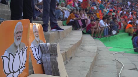 prime minister narendra modi poster during bjp election campaign rally, namo merchandise