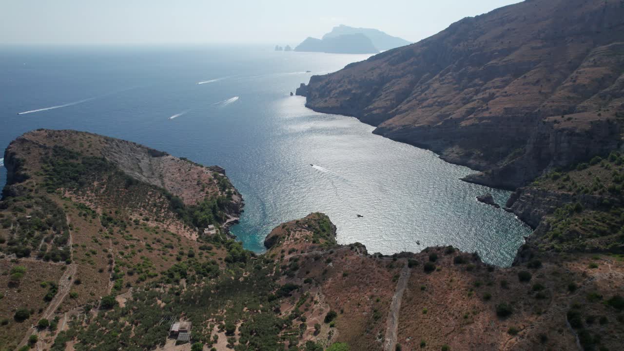 Aerial panoramic view of Ieranto bay. Salerno gulf. Slow motion. Daylight