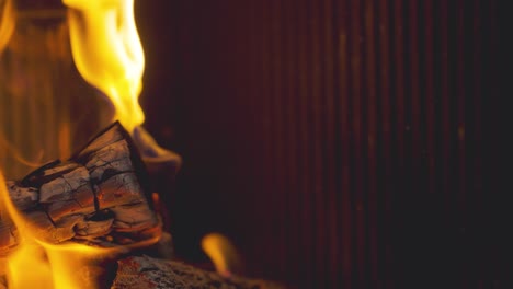 close up flames from fire made from logs in wood burning stove at home 23