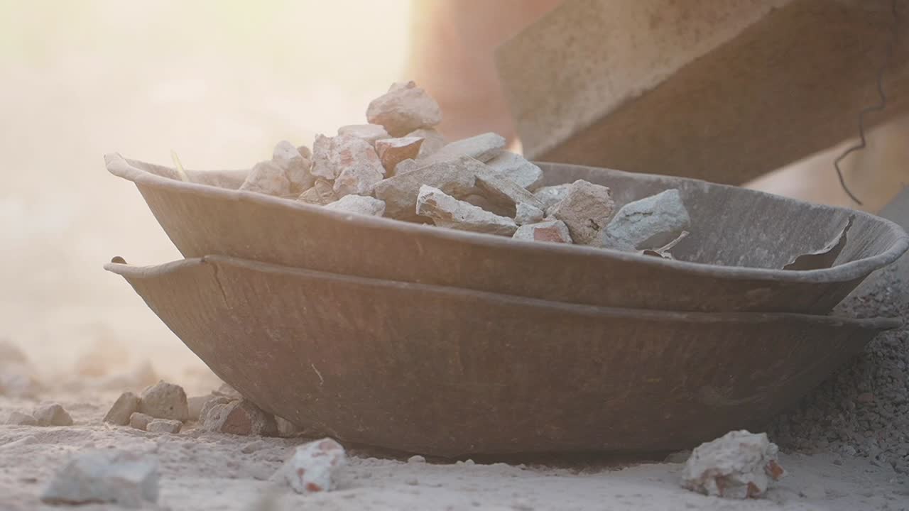Demolition Site with Debris in Metal Bowls