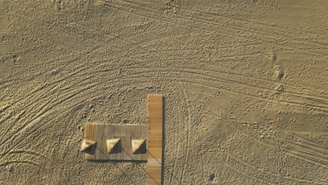 high angle view of beach zooming out to birdseye view