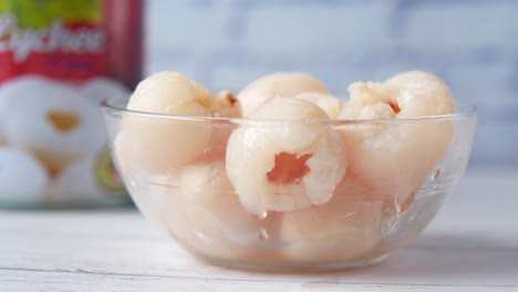 canned lychees in a glass bowl