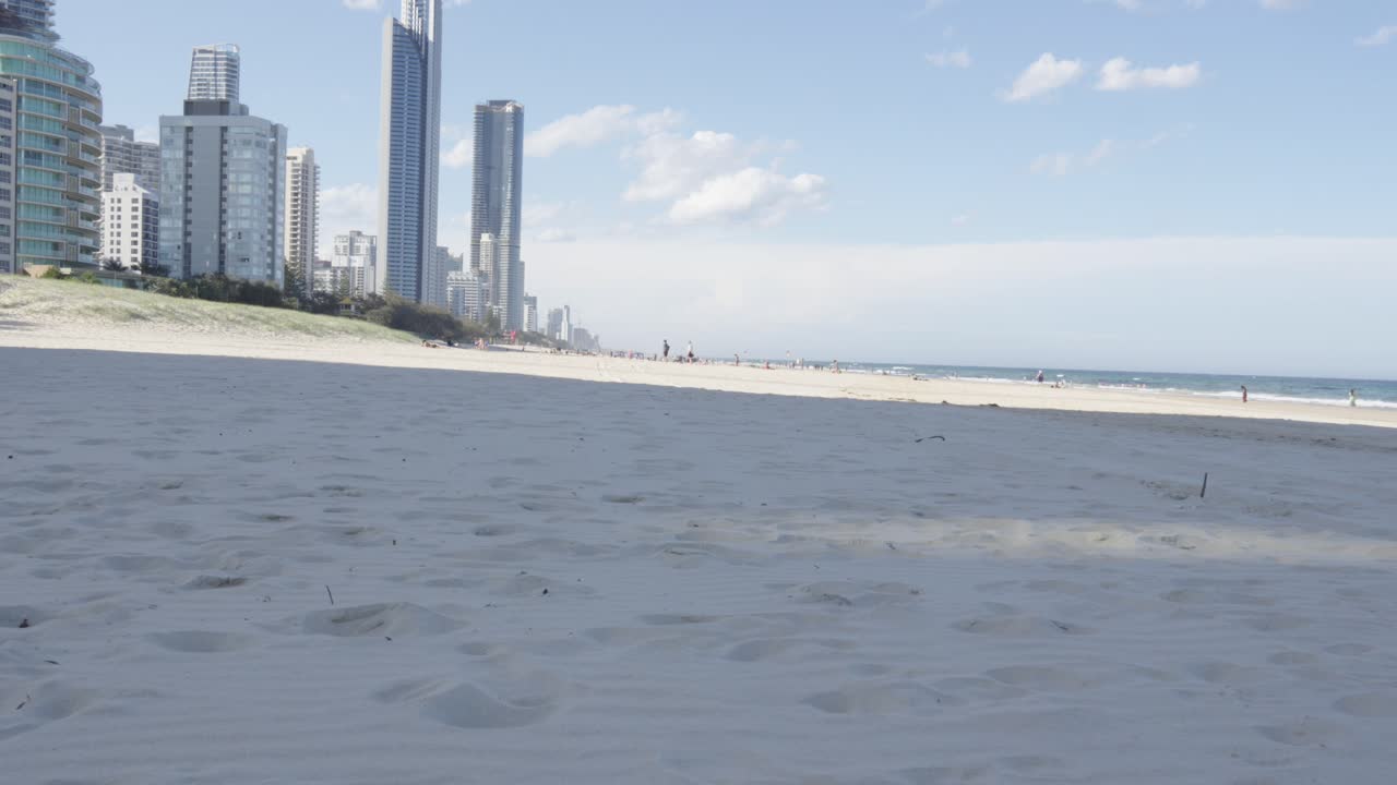 Gold Coast Australia white sand empty beach, real estate buildings oceanfront