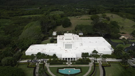 Establishing-aerial-rise-over-Laie-Hawaii-LDS-Temple,-Oahu,-Hawaii