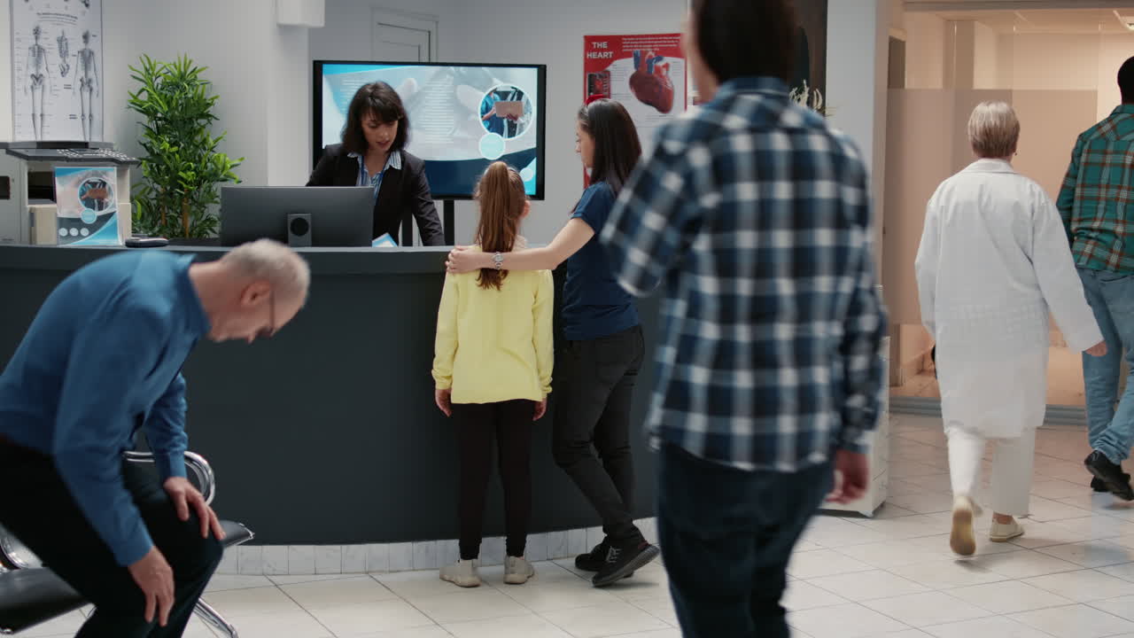 Hospital lobby with people and medical staff