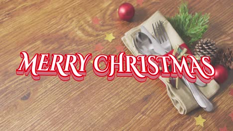 Animation-of-christmas-greetings-text-over-cutlery-with-christmas-decorations