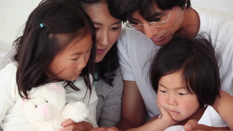 family using a tablet computer together