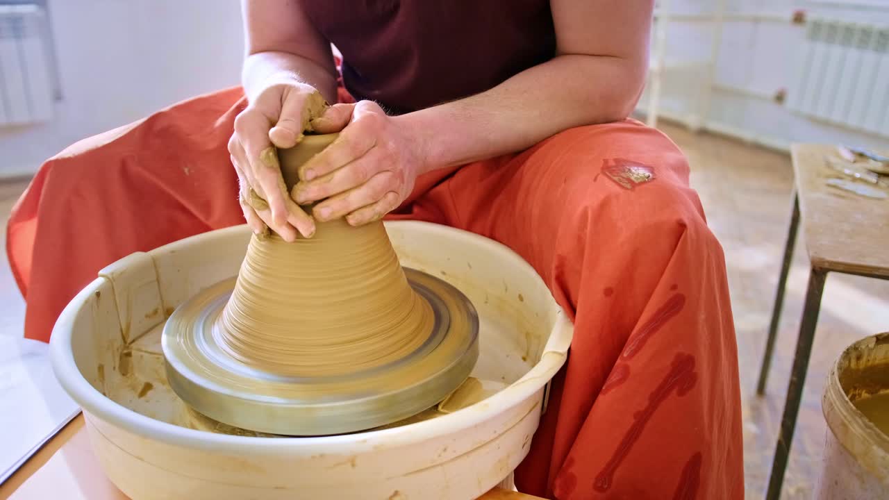 Mastering the Art of Pottery: A Hands-On Journey Capturing the Transformation of Clay from an Unformed Mass to a Beautifully Shaped Vessel on the Wheel