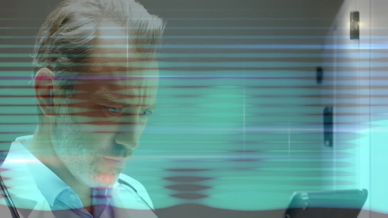 Senior male doctor interacting with tablet in medical tech UI, with green-blue light lines floating