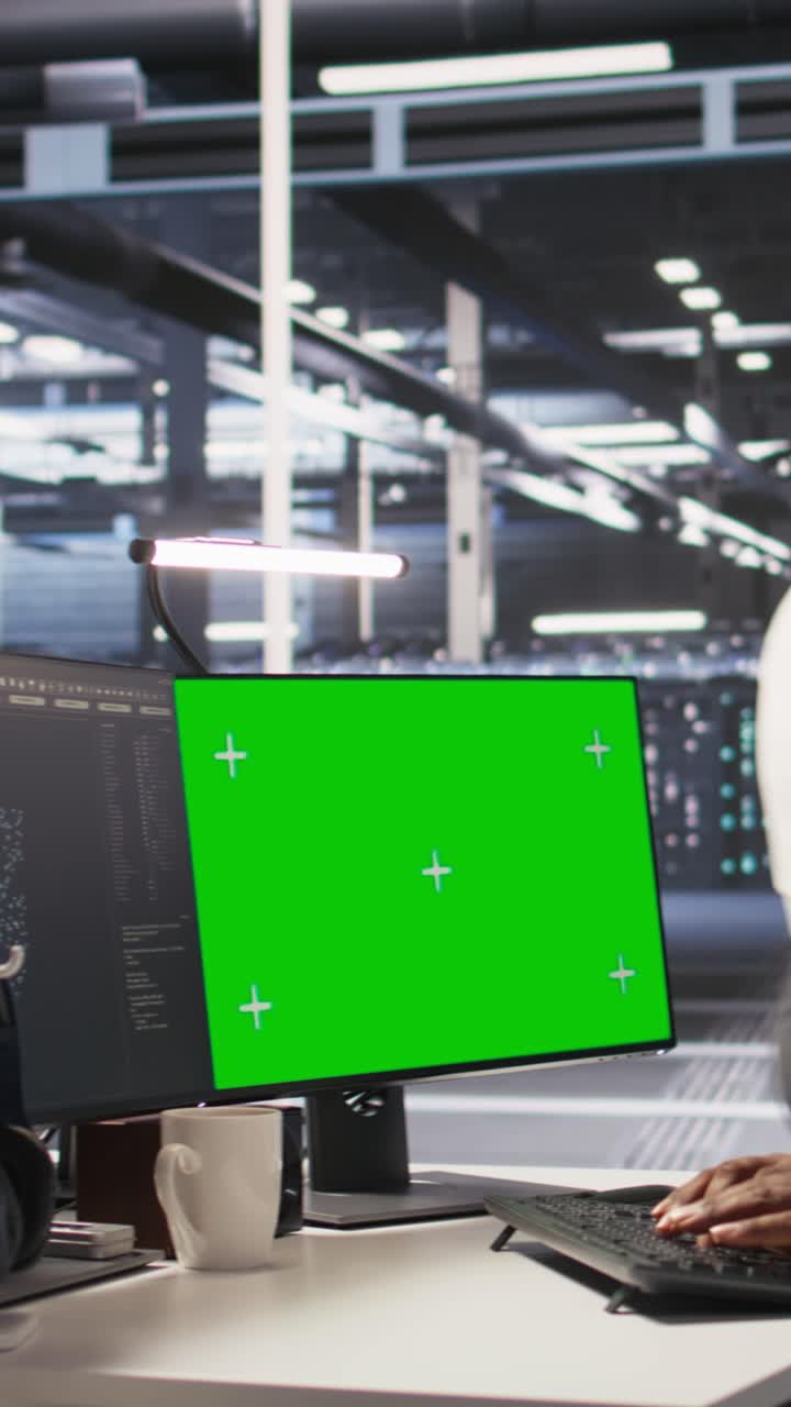 Vertical video Data center admin using isolated screen PC to monitor neural network AI