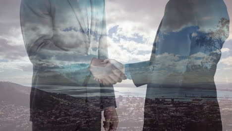 animation of business handshake and clouds