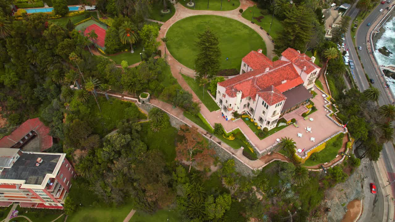 Cerro castillo presidential palace surrounded by greenery in vina del mar chile, aerial view