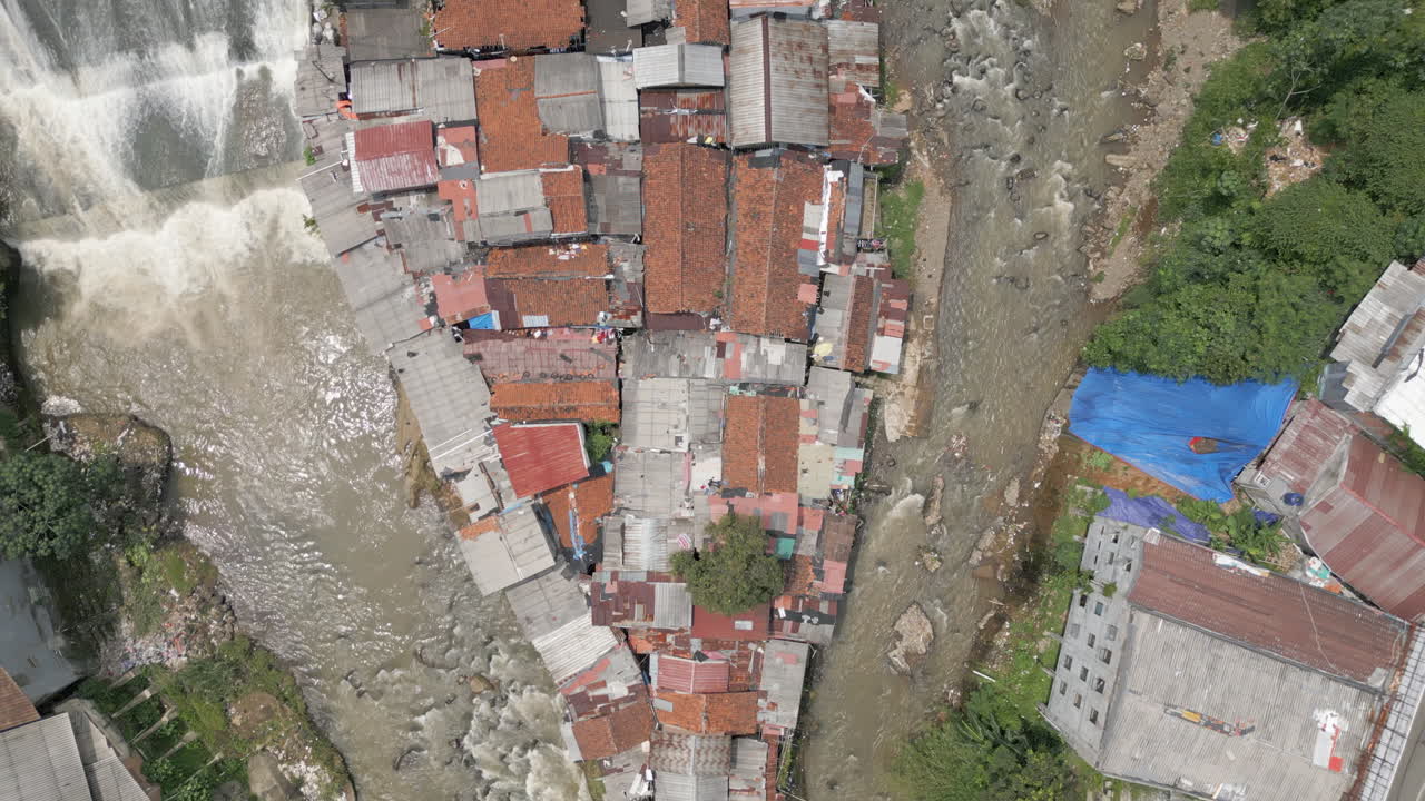 Water Flows Around Slum Island Sitting In The Middle Of Bogor River Indonesia