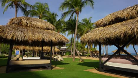 gazebos and palm trees on the caribbean coast. jamaica