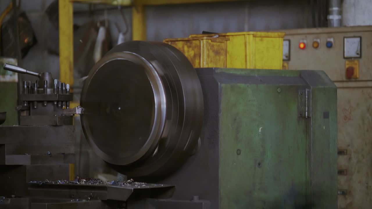 Construction in the Industry factory. Machine is working on grinding metal or steel. Concept Industrial machinery and engineering