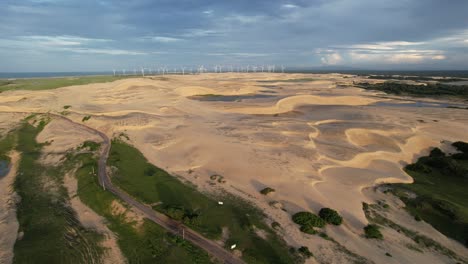 beautiful drone take of dunes in northeast brazil at dusk, magic light