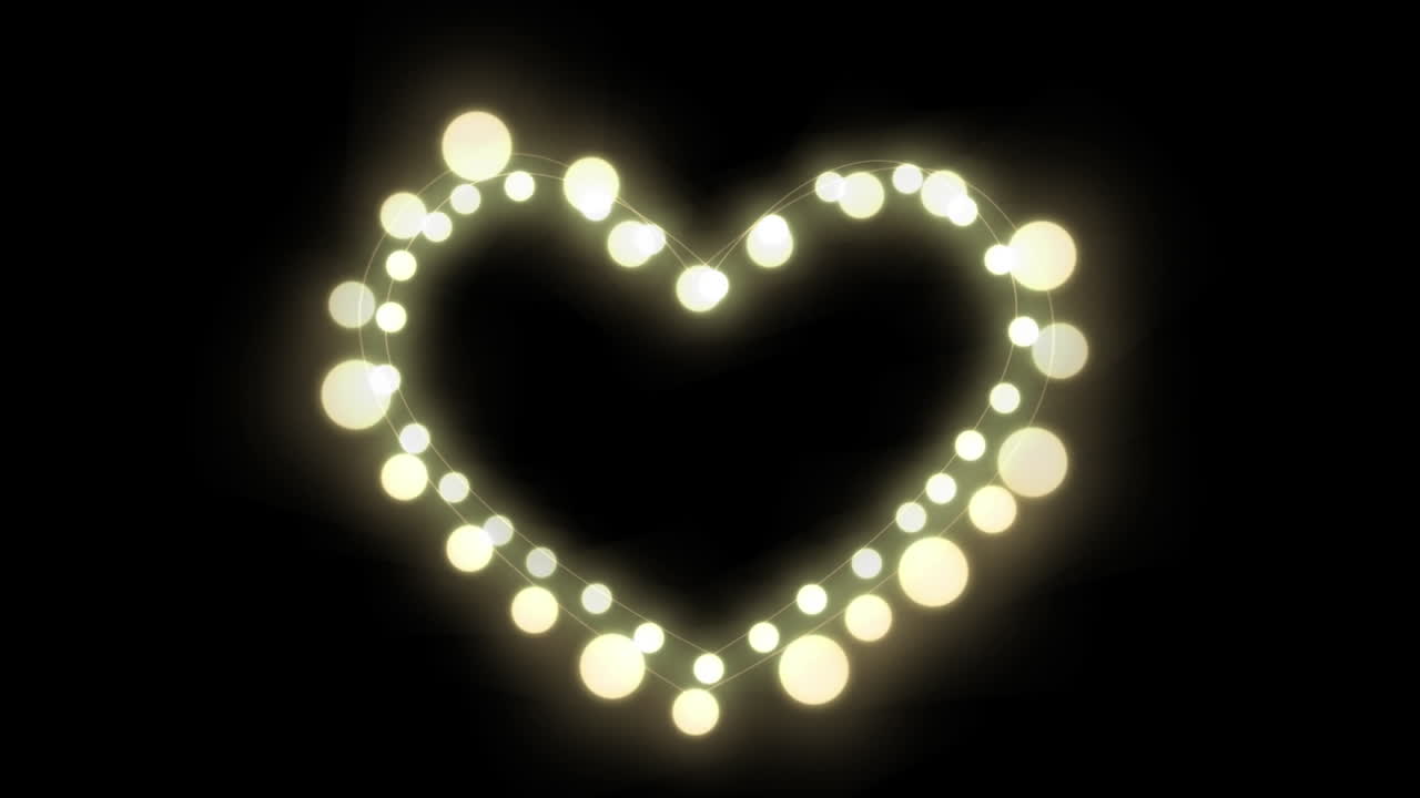 animación de luces de hadas brillantes corazón con espacio de copia en fondo negro