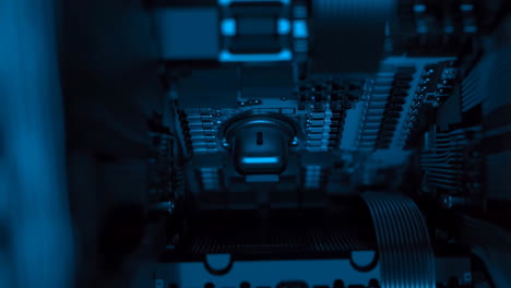 close-up of futuristic electronic components with blue light