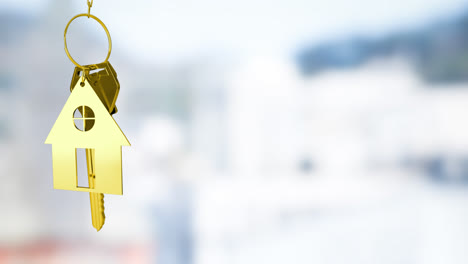 animation of golden house keys against blurred view of tall buildings