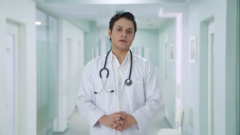stressed indian doctor thinking something