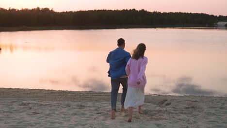 young couple by the lake