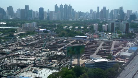 Panoramic-view-of-cityscape-and-construction-site-in-metropolis