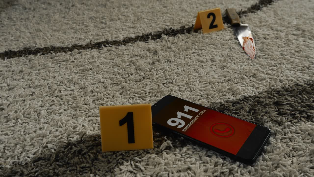 Yellow police investigation forensic crime scene markers next to a phone dialing 911 emergency number and a bloody murder weapon kitchen knife on a white modern carpet indoors at an apartment, bokeh