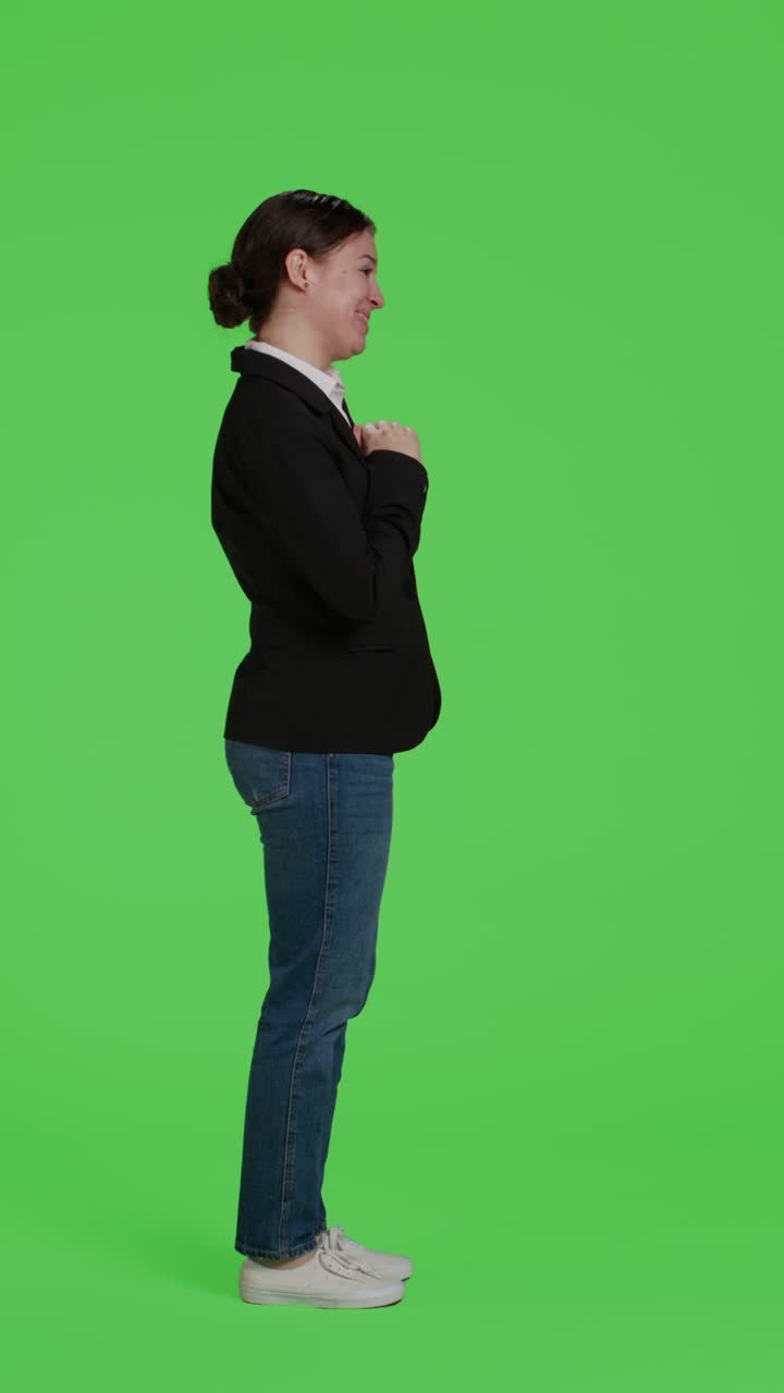 Vertical video: Profile of cheerful office worker waving hello or goodbye