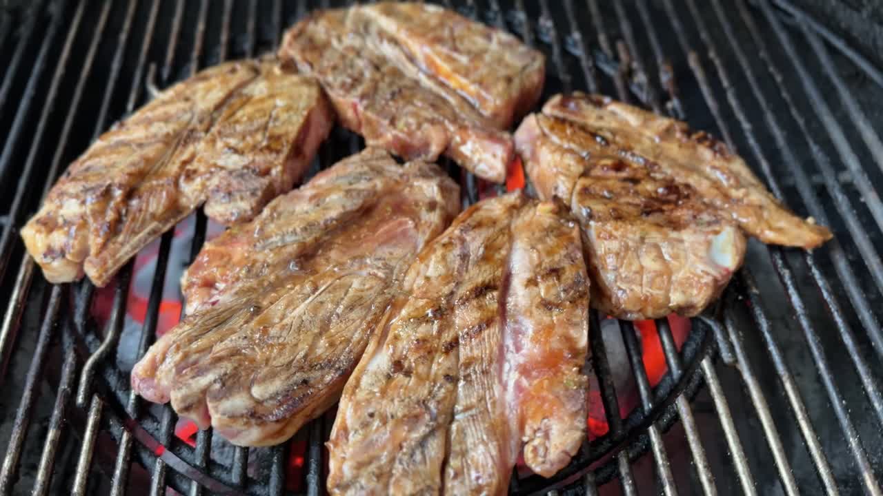 Cooking lamb chops on a barbecue
