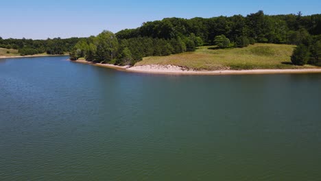 Pushing-from-the-lake-to-a-sandy-shoreline