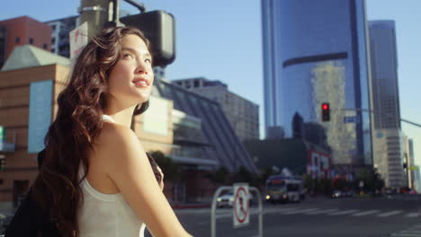 Closeup-woman-smiling-on-summer-walking.-Asian-lady-look-around-going-on-street.