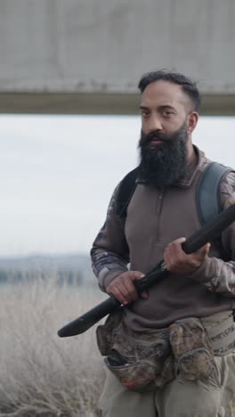 hunter with shotgun outdoors