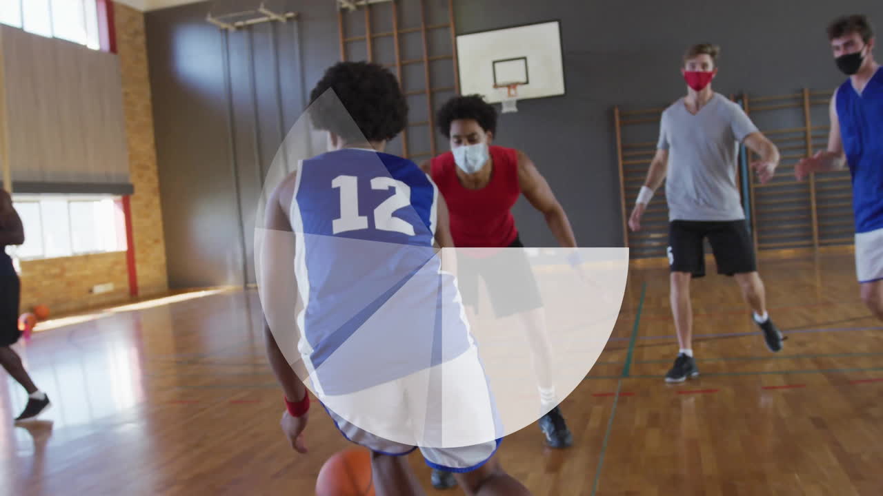 Playing basketball on court, players wearing masks with animation graphic overlay