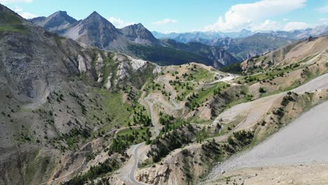 french alps mountain pass col izoard and cycling stage in tour de france - aerial 4k