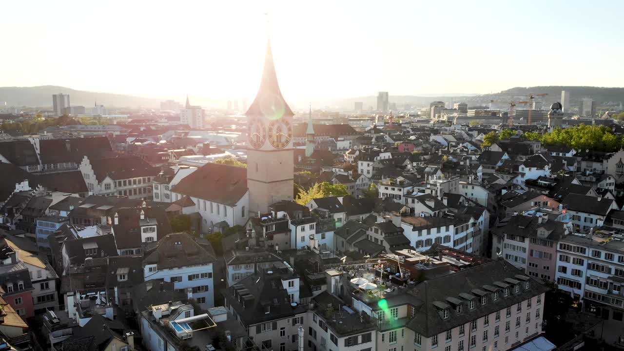 Aerial view of Zurich, Switzerland at sunset with St. Peter church