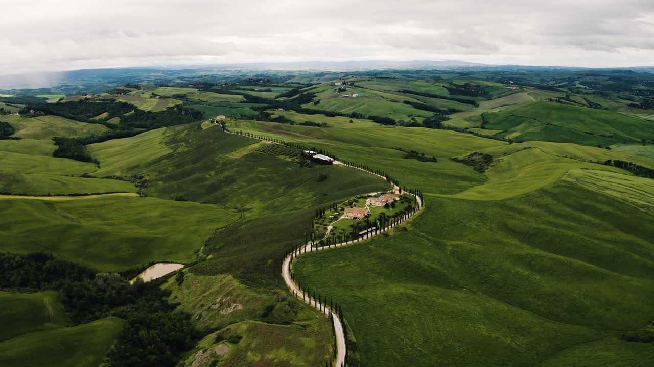 Aerial view of a large farmhouse commune in Italy's countryside