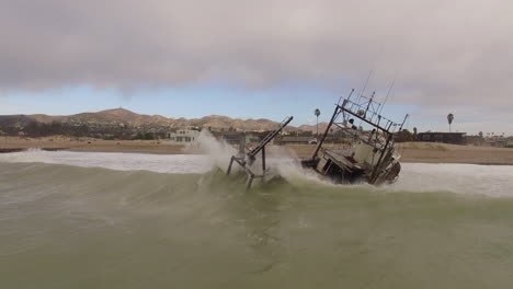 aerial shot over a shipwrecked fishing boat near ventura california 6