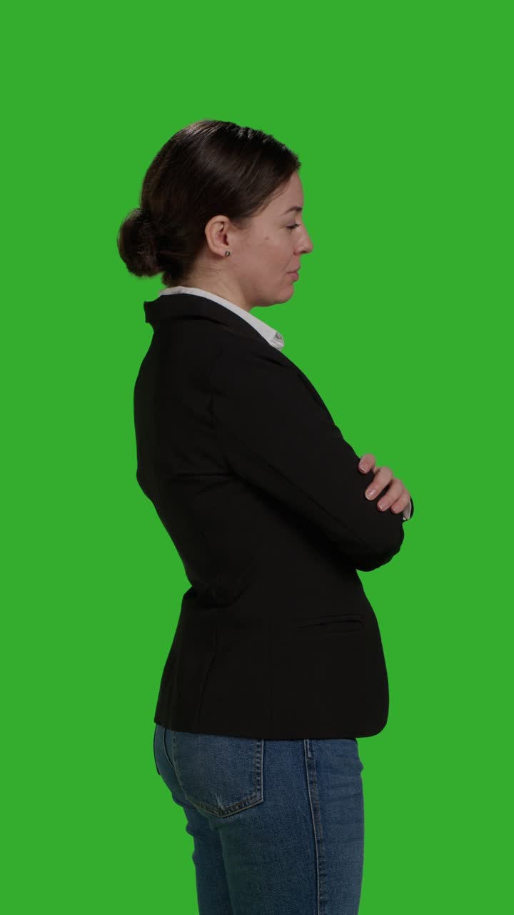 Vertical video: Profile close up of female manager wearing office suit
